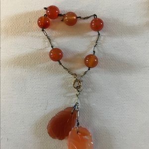 Orange jade pendant & bracelet. gold chain accents